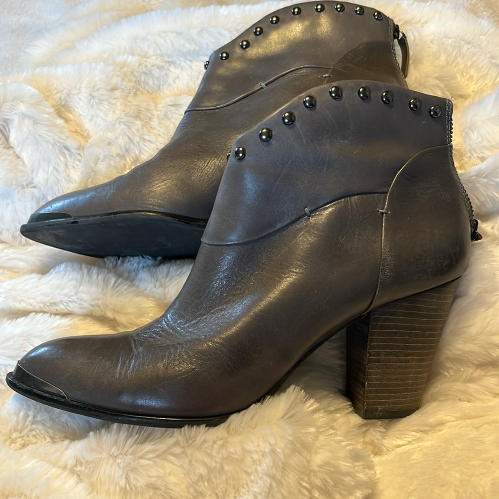 Grey leather ankle bootie.
